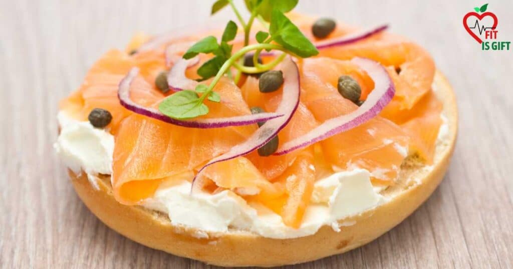 Bagel topped with smoked salmon and cream cheese - How to make Healthy Breakfast Sandwiches for weight loss